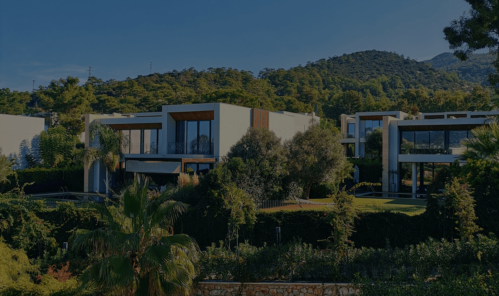 A private villa surrounded by green hills