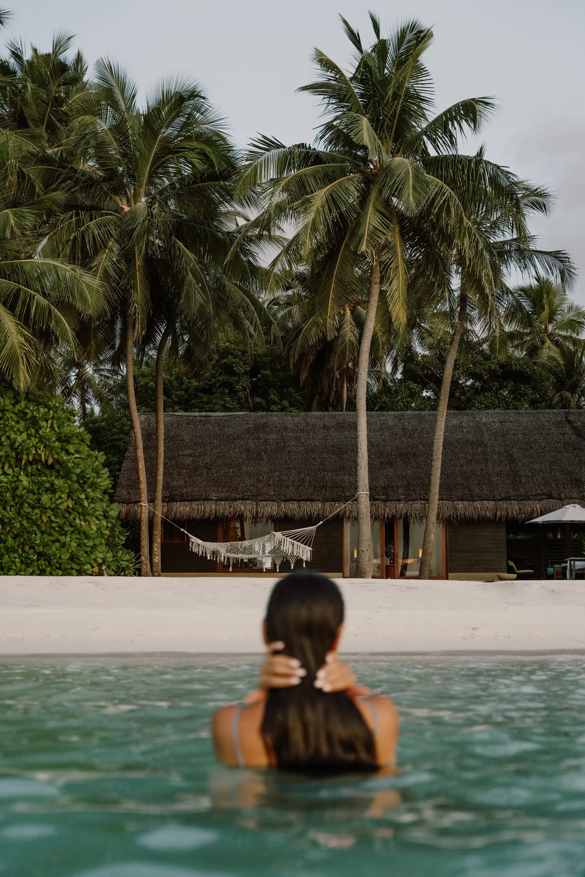 A private tropical villa beside a serene swimming pool